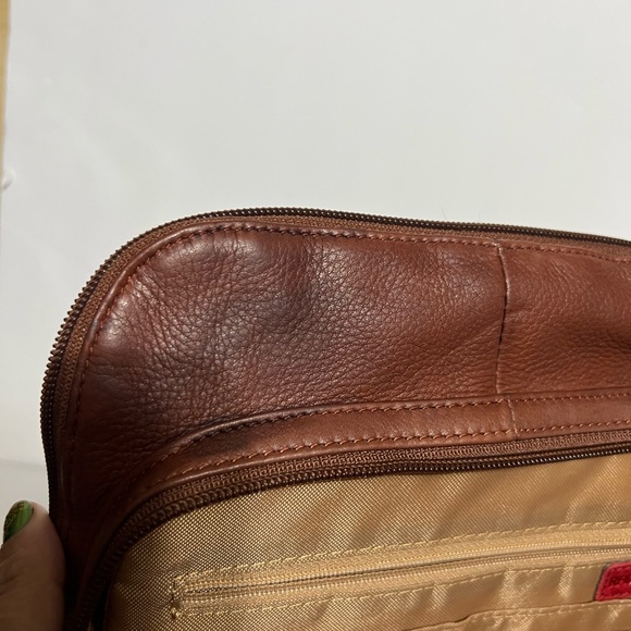 Osgoode Marley Elegant Chestnut Leather Backpack for Men